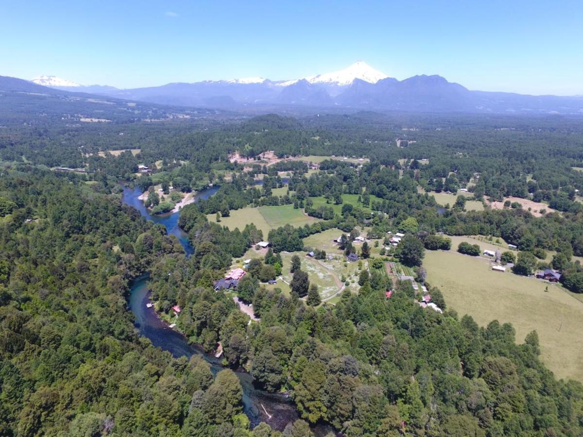 Сasa de vacaciones Canelos Pucon, Hermosa Granja De 20 Hectaréas A Orillas Del Río Liucura Pucón